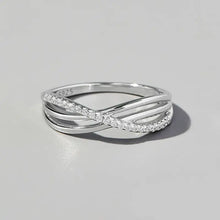 Sterling silver crossover ring with pavé cubic zirconia bands