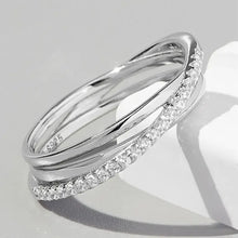 Silver-toned multi-band ring with pavé-set cubic zirconia.