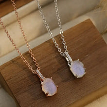 Two necklaces in rose gold and sterling silver with unpolished moonstone pendants, chain length 18 inches
