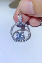 Sparkling sterling silver necklace with halo diamond pendant