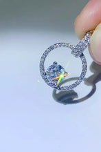 Sterling silver necklace with 18k white gold halo diamond pendant