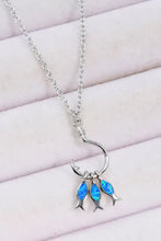Sterling silver necklace with opal fish charms, wavy design, 18-inch chain