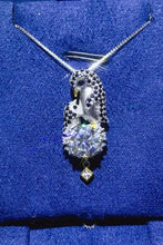 Sterling silver necklace with penguin diamond pendant and 0.5 carat moissanite