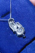 Sterling silver necklace with penguin moissanite pendant and flip-flop gem accent