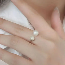 Elegant sterling silver open ring with pearl on adjustable band