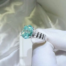 18-karat white gold aquamarine ring with sterling silver pavé band
