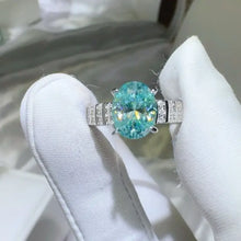 18-karat white gold aquamarine ring with 1 carat moissanite pavé band