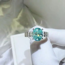 Sterling silver oval aquamarine ring with pavé band