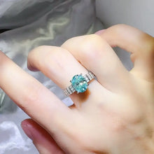 Sterling silver oval aquamarine ring with pavé band