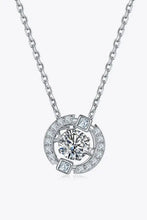 Sterling silver moissanite pendant with accent stones and central diamond