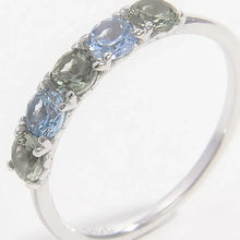 Sterling silver rhinestone ring with blue and green gemstones