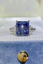 Sterling silver ring with purple sapphire and trapezoid diamonds