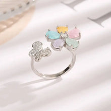 Sterling silver ring with sparkling butterfly and zircon flower gemstones
