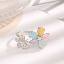Sterling silver ring with sparkling butterfly and zircon flower gemstones
