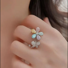 Sterling silver ring with pastel zircon flower and butterfly gemstones