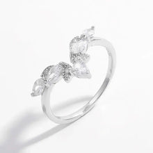 Sterling silver ring with marquise and pear inlaid zircon stones