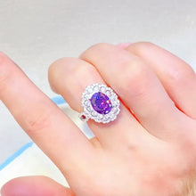 Sterling silver ring with oval purple gemstone and 1 carat moissanite halo