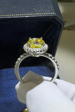 18-karat white gold sterling silver ring with cushion oval yellow diamond halo