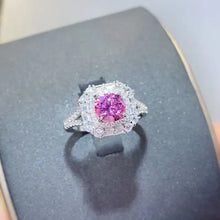 Sterling silver ring with pink gemstone and carat moissanite zircon halo