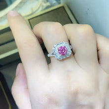 Sterling silver ring with pink gemstone and 1 carat moissanite halo