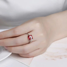 Sterling silver ring with square red gemstone and diamond accents