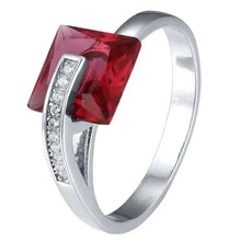 Sterling silver ring with square red gemstone and diamond accents