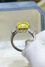 Sterling silver ring with yellow cushion 1 carat moissanite and baguettes