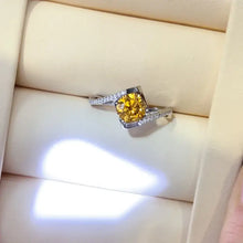 Sterling silver yellow moissanite ring with pavé diamond accents