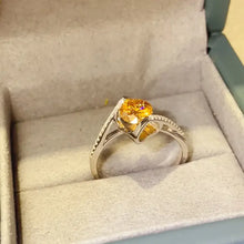 18k white gold ring with 1 carat moissanite citrine and diamond accents