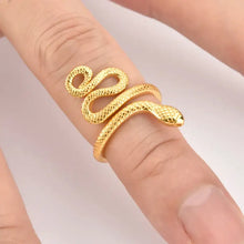 Gold-toned sterling silver snake shape ring on finger