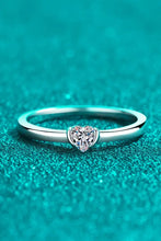 Sterling silver moissanite solitaire ring with heart-shaped pink gemstone accent