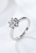 Sterling silver solitaire ring with round brilliant cut diamond