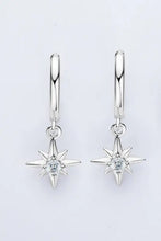 Sterling silver star drop earrings with moissanite accents