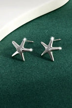 Pair of sterling silver star stud earrings with matching box