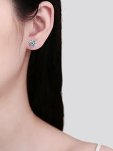 Sterling silver stud earrings with carat moissanite and pavé accents