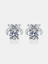 Sterling silver stud earrings with brilliant cut stones and pavé accents
