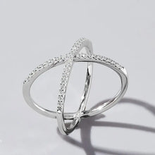 Sterling silver X-shaped ring with pavé inlaid zircon diamonds