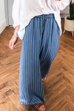 Blue and white striped chambray wide leg jeans with tied elastic waist and comfortable elastic waistband