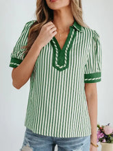 Green and white striped short bubble sleeve blouse with collar and contrasting green trim on neckline and cuffs