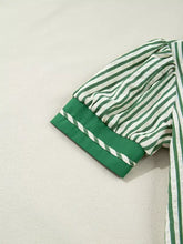 Green and white striped short bubble sleeve blouse with ribbed cuff featuring diagonal stripes and split neck collar