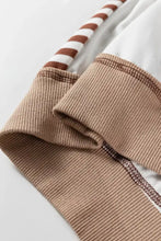 Tan ribbed knit sleeve with brown and white striped cuff on stripe colorblock patchwork contrast stitching sweatshirt machine wash cold