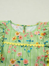 A vibrant green stripe floral ruffle short sleeve blouse with vertical stripes floral pattern and scalloped yellow trim