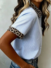 Blue and white striped short sleeve button-up shirt with leopard print collar and sleeve cuffs for casual wear