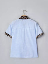 Light blue and white striped short sleeve shirt with leopard print collar and sleeve cuffs for casual wear