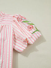 Pink and white striped blouse with floral embroidered puff sleeve and v neck detail perfect for casual wear