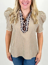 Beige and brown vertically striped neck blouse with puff sleeve, ricrac trim, scalloped edges, and leopard print lace collar