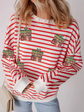 Red and white striped sweatshirt featuring sparkling sequin christmas gift patches and machine wash convenience