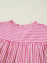 Pink and white striped ruffled short sleeve blouse with shirred yoke and ruffled neckline