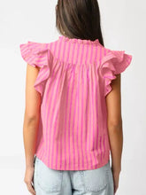 A vibrant pink and magenta stripe split neck ruffled summer blouse with ruffled shoulder details