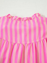 A vibrant pink stripe split neck ruffled summer blouse with off-the-shoulder design and gathered waistband